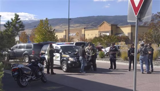 Police set up a command center Friday outside the Fire Creek Crossing Walmart in south Reno, Nev., where&nbsp;a gunman was holed up for hours after shooting three co-workers, authorities said.